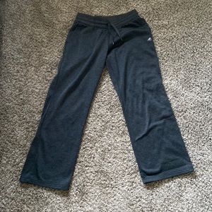 Dark gray fleece Adidas sweat pants.